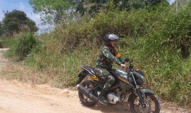 Gunakan  Kendaraan Dinas,Babinsa Kodim 0301/Pbr Laksanakan Patroli Karhutla