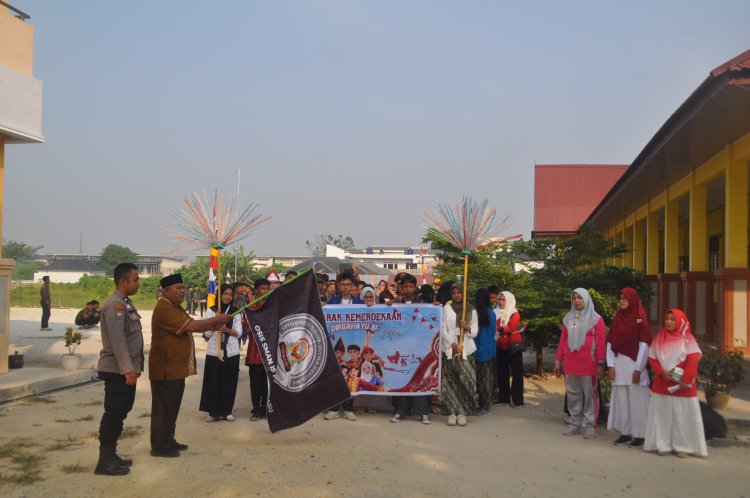 SMAN 19 Pekanbaru Warnai Peringatan HUT RI Ke -81 Dengan Pawai Akbar